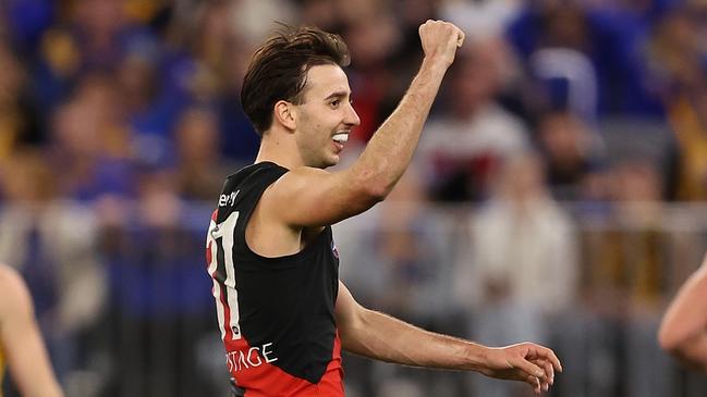 PERTH, AUSTRALIA - MAY 04: Nic Martin of the Bombers celebrates winning the round eight AFL match between West Coast Eagles and Essendon Bombers at Optus Stadium, on May 04, 2024, in Perth, Australia. (Photo by Paul Kane/Getty Images)