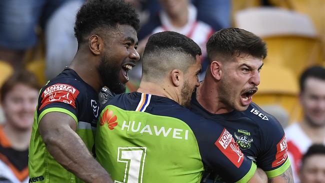 BRISBANE, AUSTRALIA - MAY 15: Curtis Scott of the Raiders celebrates with team mates after scoring a try during the round 10 NRL match between the Canterbury Bulldogs and the Canberra Raiders at Suncorp Stadium, on May 15, 2021, in Brisbane, Australia. (Photo by Albert Perez/Getty Images)