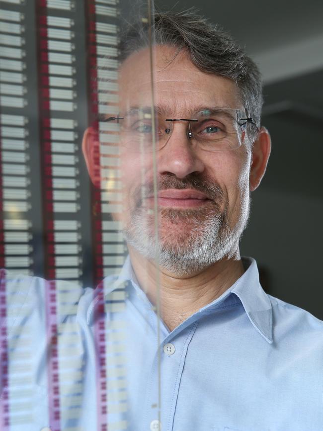 Paul Dastoor with lickable strips to measure sugar levels. Photo: Britta Campion