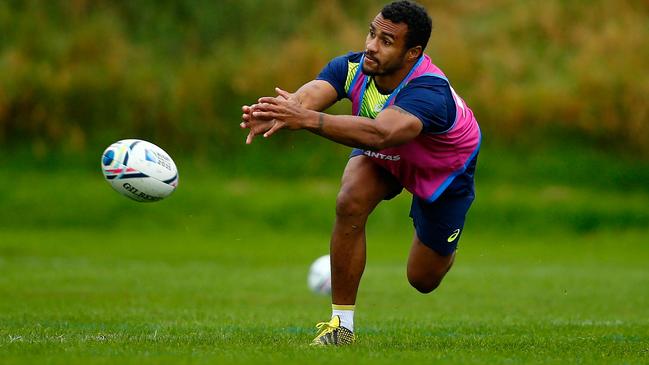 BATH, ENGLAND - SEPTEMBER 21: Will Genia of Australia releases a pass during a training session at the University of Bath on September 21, 2015 in Bath, United Kingdom. (Photo by Dan Mullan/Getty Images)