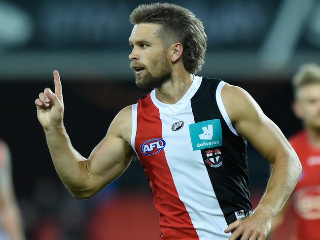 GOLD COAST, AUSTRALIA - AUGUST 06: Dan Butler of the Saints celebrates kicking a goal during the round 10 AFL match between the Gold Coast Suns and the St Kilda Saints at Metricon Stadium on August 06, 2020 in Gold Coast, Australia. (Photo by Matt Roberts/AFL Photos/via Getty Images)