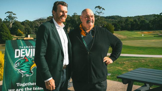Brendon Gale CEO Tasmania Football Club with David Foster champion axeman. Launch of 'together, we are the team' poster and coaster campaign, a joint initiative by the Tasmania Football Club and the Tasmanian Hospitality Association. Picture: Tasmania Football Club