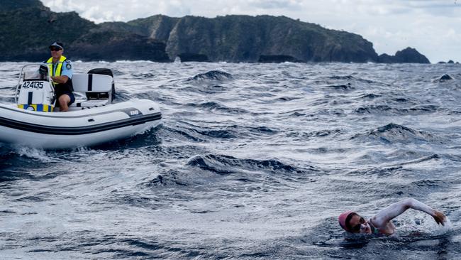 Lauren Tischendorf braves sharks and rough conditions in her 13 hour and 50 minute marathon ocean swim around Lord Howe Island. Picture: Bradley Farley