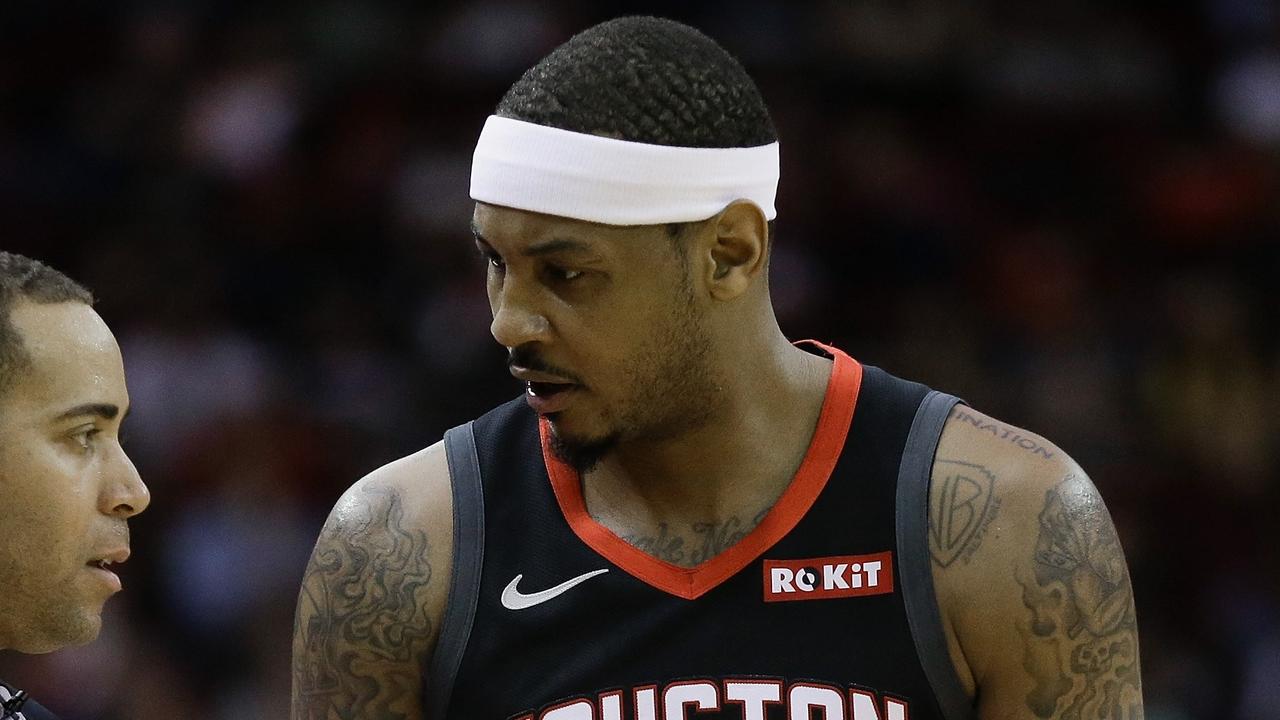 Carmelo Anthony appears on his way out.