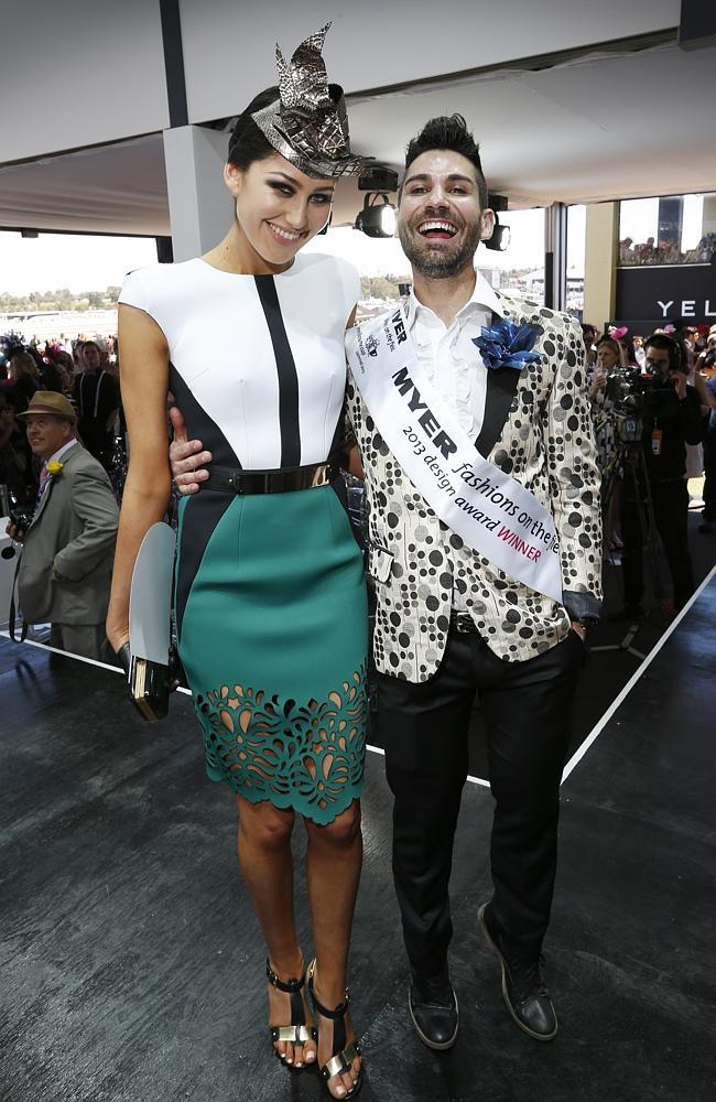 Winner of the Designer Award at Fashions on the Field, Oscar Calvo with model Katherine Grandja. Picture: David Caird