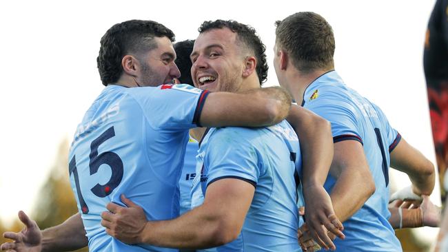 Dylan Pietsch of the Waratahs celebrates with Ben Donaldson after scoring in a match last year.