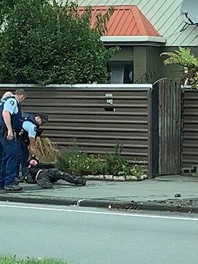 The officers subdue Tarrant before taking him into custody. Picture: Supplied