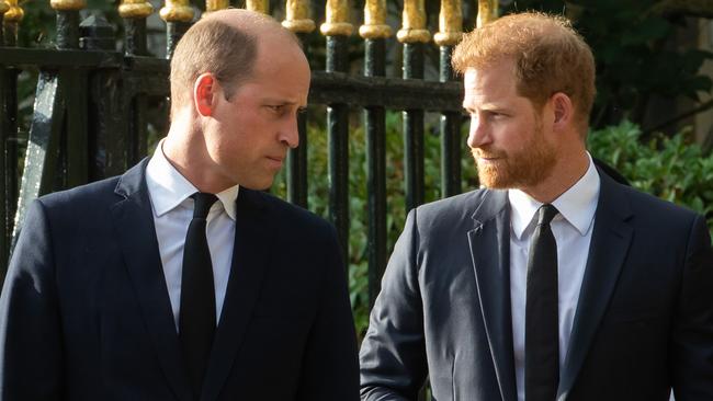 Prince William, the new Prince of Wales, and Prince Harry, the Duke of Sussex, arrive to view floral tributes to Queen Elizabeth II laid outside Cambridge Gate at Windsor Castle on 10th September 2022 in Windsor, United Kingdom. Queen Elizabeth II, the UK's longest-serving monarch, died at Balmoral aged 96 on 8th September 2022 after a reign lasting 70 years. (photo by Mark Kerrison/In Pictures via Getty Images)