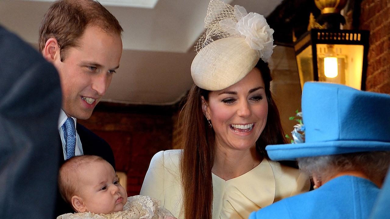 Prince William, Kate Middleton and the Queen at Prince George’s christening. Picture: JOHN STILLWELL / AFP.