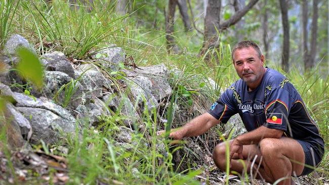 Wit-boooka at wall-like rocky structures which some say shows terracing by past occupants of the site, now owned by the Transport and Main Roads Department and slated for the route of the Bruce Highway&#39;s Cooroy-to-Curra by-pass of Gympie. Picture: Patrick Woods