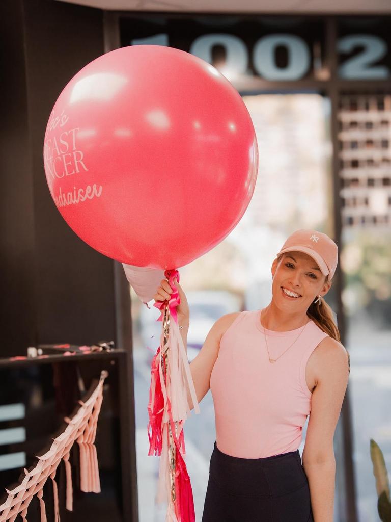 Bec at her gym's fundraiser halfway through her chemotherapy where they raised $8,800 for the McGrath Foundation. Picture; HelloThere Images