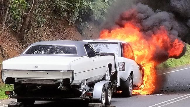 An SUV towing a trailer and vehicle on Mossman Mount Molloy Rd caught fire on December 28. Picture: Facebook