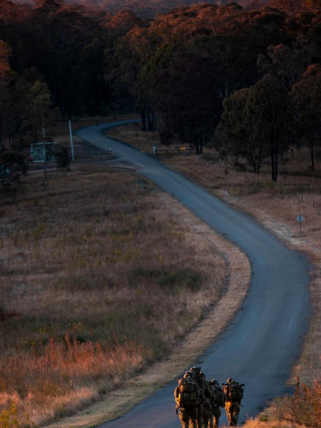 Australian army soldiers from the 3rd Battalion, Royal Australian Regiment, conduct a section patrol during the 2022 Duke of Gloucester Cup in Singleton. *** Local Caption *** Australian Army infantry soldiers from across Australia tested their core skills for the prestigious Duke of Gloucester Cup at the School of Infantry, near Singleton in NSW, July 31 - August 5 2022. The Duke of Gloucester Cup is the Armyâ€™s premier military skills competition, pitting the best Royal Australian Corps of Infantry rifle sections from each unit against one another through a series of challenging activities that test their core infantry skills, including marksmanship, tactics, teamwork and fitness. Along with the Duke of Gloucester Cup, five other trophies are awarded: Sir Arthur MacDonald Trophy for best foundation war-fighting skills; Gurkha Trophy for best live-fire shooting; Royal Ulster Rifles Trophy for best falling plate shooting; OSCMAR Trophy for best battle endurance; and the DSM Roche CSC Memorial Cup for best individual soldier. The Duke of Gloucester Cup was created by Prince Henry, Duke of Gloucester, in 1946, while serving as the Governor-General of Australia.