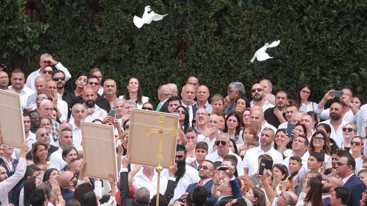 Doves and balloons were released during the ceremony. Picture: John Feder/The Australian
