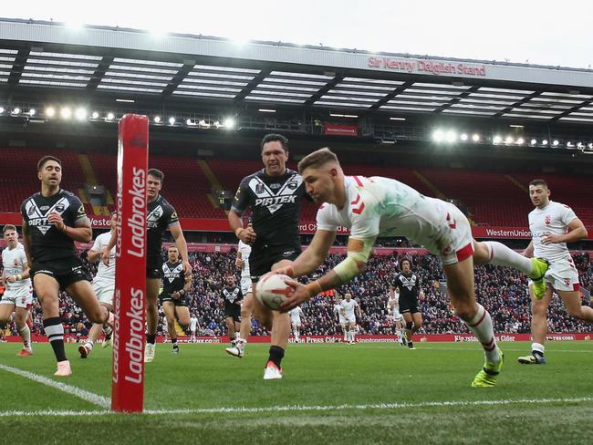 Tommy Makinson scores a try for England against New Zealand last year. Picture: Michael Steele/Getty Images