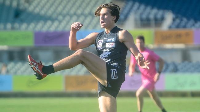 Sam Fisher kicks Northern Blues forward in the VFL. Picture: Amy Paton.