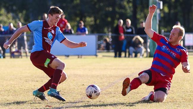 Nerang’s Eric Leonard (right).