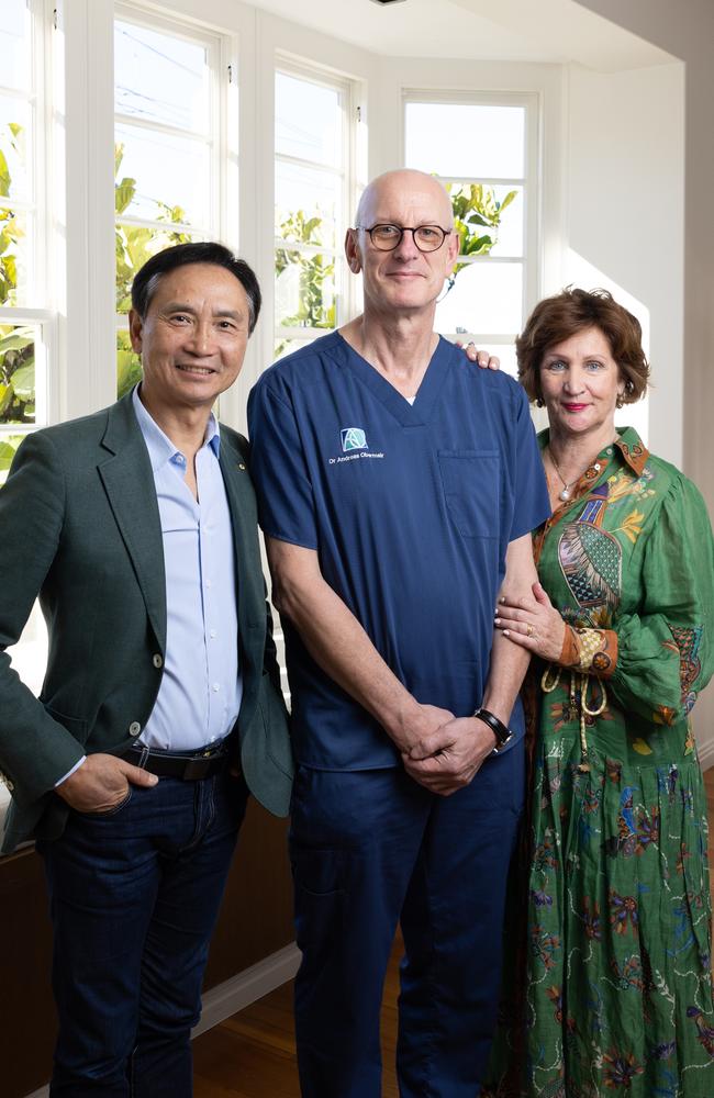 Li Cunxin, wife Mary Li and the specialist they credit with saving Mary’s life from cancer, gynaecological oncologist Professor Andreas Obermair. Picture: David Kelly