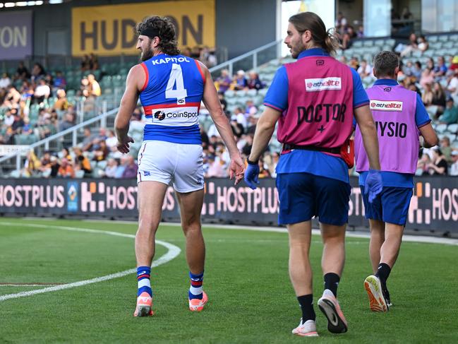 Marcus Bontempelli left the field in the opening minutes of the Bulldogs’ win over Hawthorn. Picture: Steve Bell/Getty Images