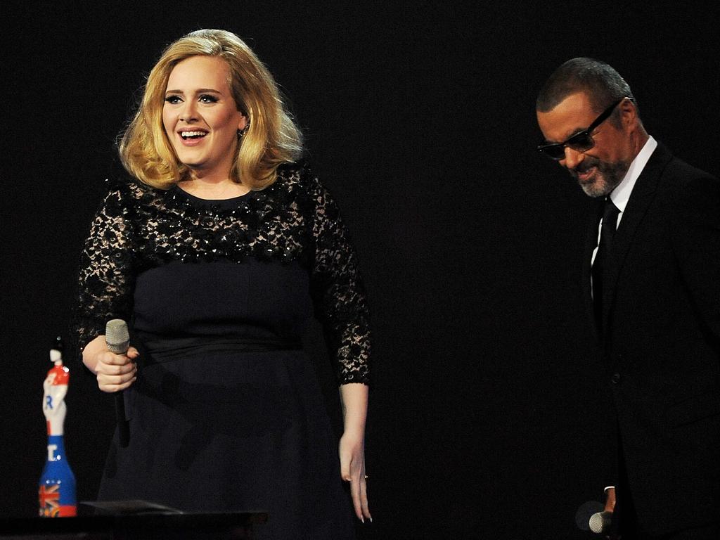 February 21 2012. Adele (L) accepts the Best Album award from George Michael during the BRIT Awards 2012 held at the O2 Arena on February 21, 2012 in London, England. Picture: Getty
