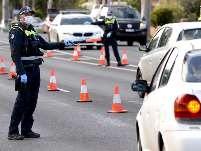 MELBOURNE, AUSTRALIA - NewsWire Photos JULY 2: Police perform random checks on drivers and passengers at Camp Road Broadmeadows on the first morning that the area is officially locked down due to an increased rate of COVID-19 infections. Picture: NCA NewsWire / Andrew Henshaw