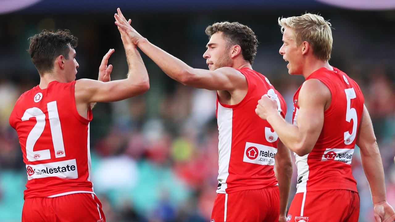 Will Hayward celebrates with team mates after kicking a goal. Picture: Matt King