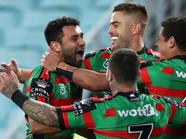 SYDNEY, AUSTRALIA - SEPTEMBER 25:  Alex Johnston of the Rabbitohs celebrates with team mates after scoring a try during the round 20 NRL match between the South Sydney Rabbitohs and the Sydney Roosters at ANZ Stadium on September 25, 2020 in Sydney, Australia. (Photo by Cameron Spencer/Getty Images)