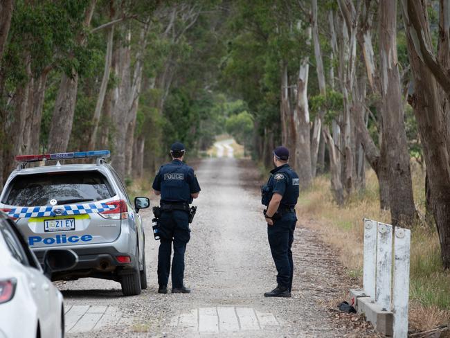 Police manning a roadblock at Parkham, where Mr Gerard was ultimately apprehended.