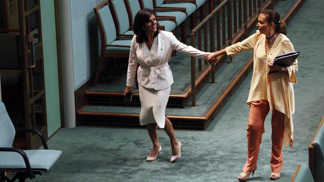 Former Liberal, and now crossbencher, Julia Banks and Labor’s Anne Aly in parliament yesterday. Picture: Gary Ramage