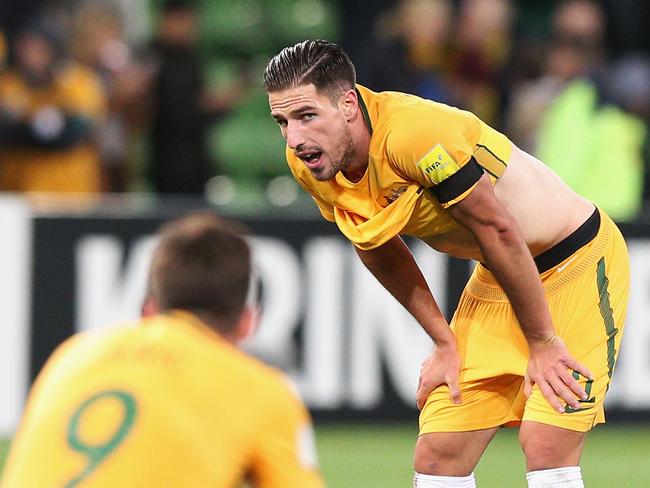 MELBOURNE, AUSTRALIA - SEPTEMBER 05:  Milos Degenek of the Socceroos reacts after the whistle during the 2018 FIFA World Cup Qualifier match between the Australian Socceroos and Thailand at AAMI Park on September 5, 2017 in Melbourne, Australia.  (Photo by Michael Dodge/Getty Images)