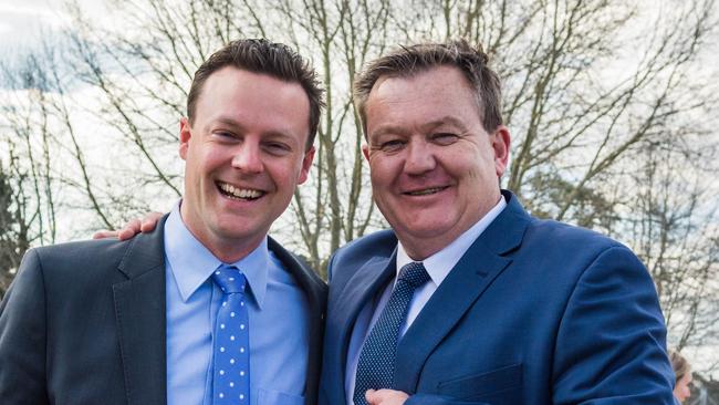 Dunkley federal Liberal MP Chris Crewther and Frankston Liberal candidate Michael Lamb are all smiles at news that electrification of the rail line to Baxter is a step closer.