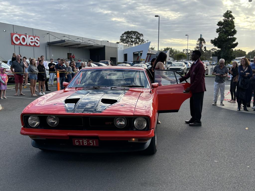 Marc Tero and Patrica Manly arrive at the formal in a XBGT Ford Falcon.