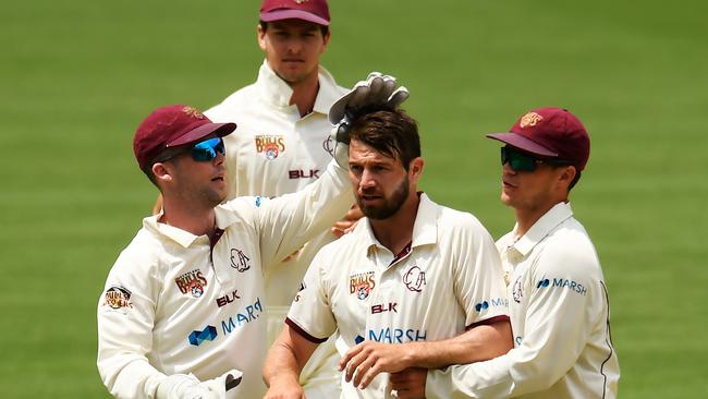 Queensland celebrates after Neser dismissed WA’s Jhye Richardson. Photo: AAP Image/Albert Perez