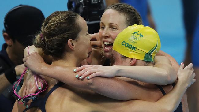 Australia's Leah Neale, Emma McKeon, Bronte Barratt, Tamsin Cook celebrate winning the silver medal in the Women's 4 x 200m Freestyle Relay Final at the Rio 2016 Olympic Games. Picture. Brett Costello