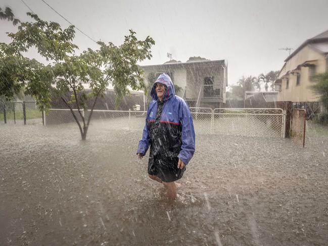 3 February 2019Frank Pery stands on his street in Railway Estate, Townsville during flooding.Photo: Glenn Hunt / The Australian