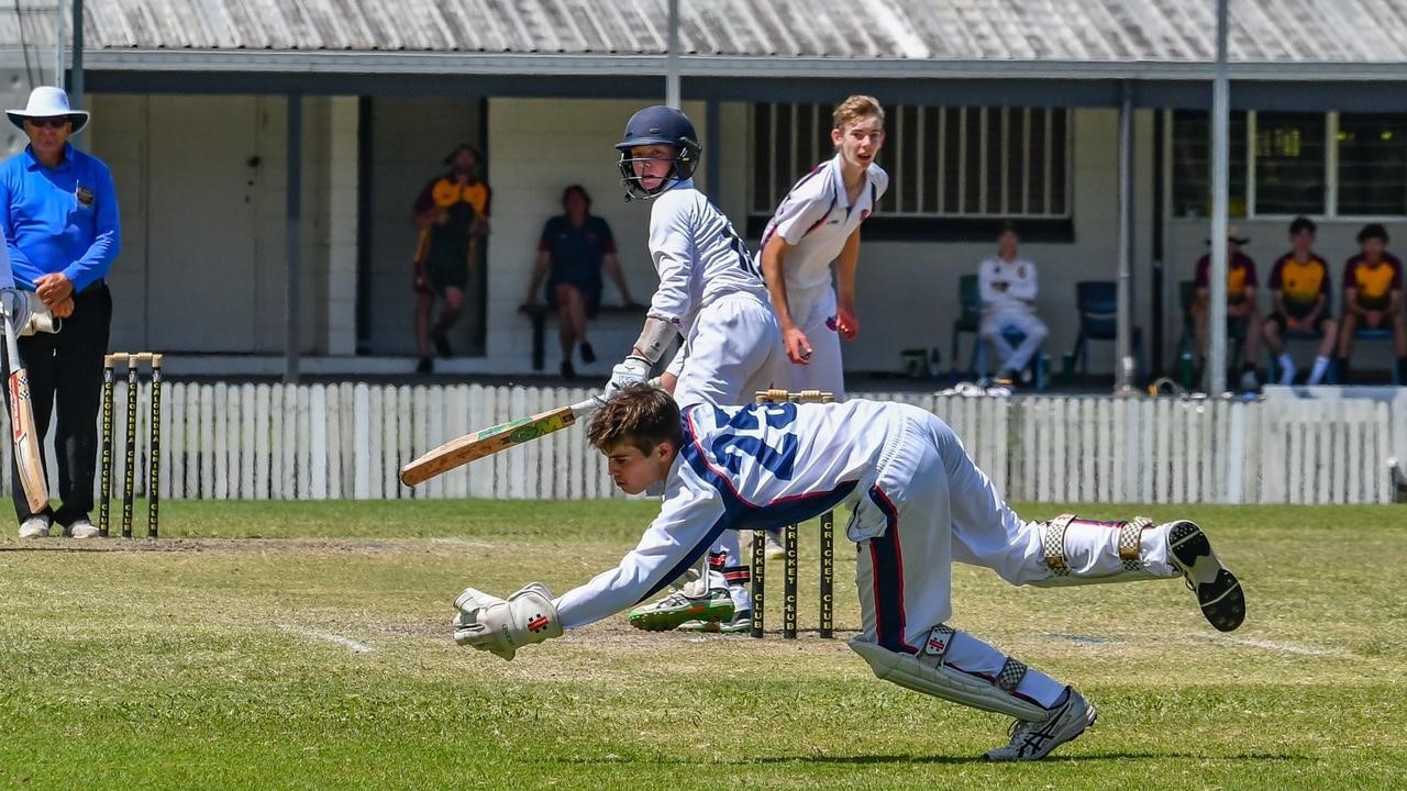 Alex Walduck takes a catch in Tav's cricket - he will be Churchie's gloveman next season after playing this year as a batsman.