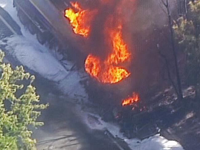 **HIGH-RES** A 36,000 litre fuel tanker on fire on the Princes Motorway near the Princes Highway in West Wollongong. Picture: Seven News