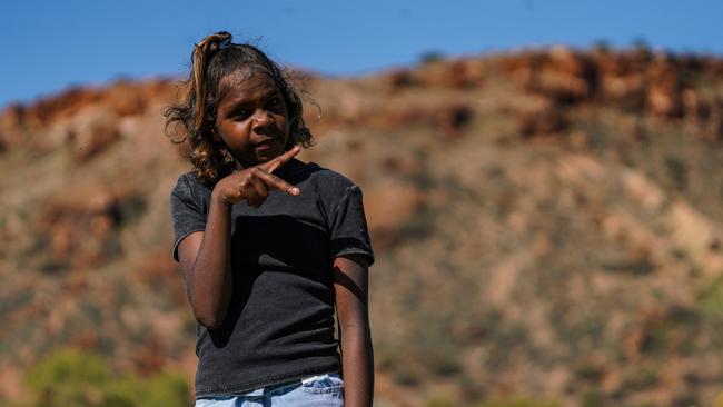 Melbourne Demons players Shane McAdam and Andy Moniz-Wakefield went to Santa Teresa ahead of the 2025 AFL game in Alice Springs. Picture: Melbourne Demons