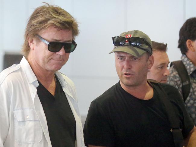 Mates Richard Wilkins and Karl Stefanovic catch up over luggage collection duties at Sydney Airport. Picture: DIIMEX