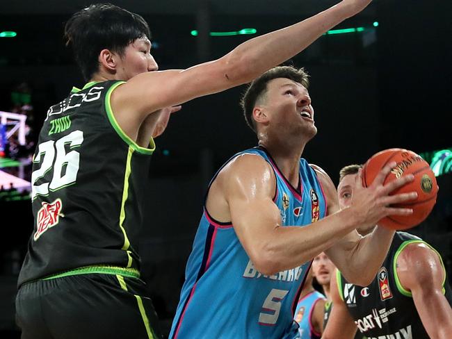 Premier big men Zhou Qi and Yanni Wetzell will go head to head. Picture: Getty Images