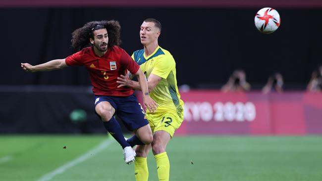 Mitch Duke (right) challenges Spain’s Marc Cucurella at the Tokyo Olympics. Picture: Masashi Hara/Getty Images