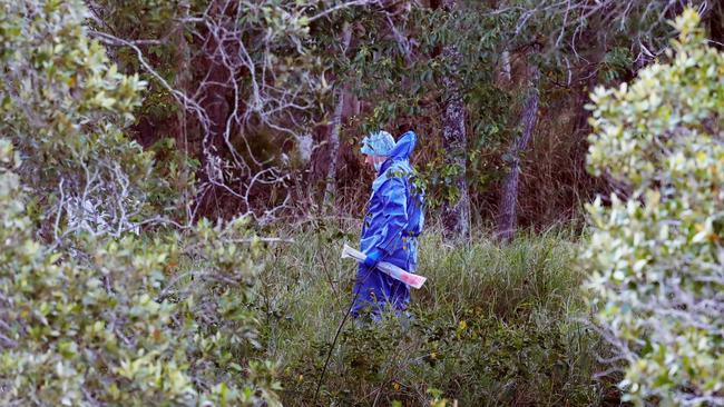 Police at the crime scene at Martin Sheils Park. Picture Glenn Hampson