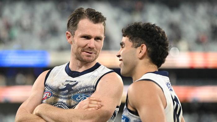 GEELONG, AUSTRALIA - JULY 02: Patrick Dangerfield of the Cats chats with Tyson Stengle of the Cats following the round 16 AFL match between the Geelong Cats and the North Melbourne Kangaroos at GMHBA Stadium on July 02, 2022 in Geelong, Australia. (Photo by Morgan Hancock/Getty Images)