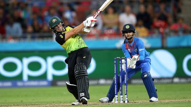 Australia's Ashleigh Gardner smashes a boundary during the ICC Women's T20 World Cup. Picture. Phil Hillyard