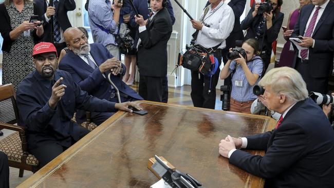 Kanye West sports a MAGA cap as he meets Donald Trump in the Oval Office on October 11, 2018. Picture: Getty Images