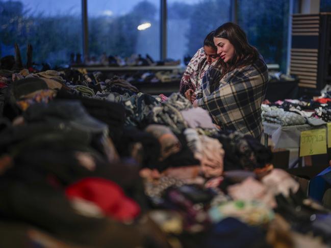 Survivors of the Nova music festival view personal items recovered from the festival site after the October 7 Hamas attack. Picture: Christopher Furlong/Getty Images