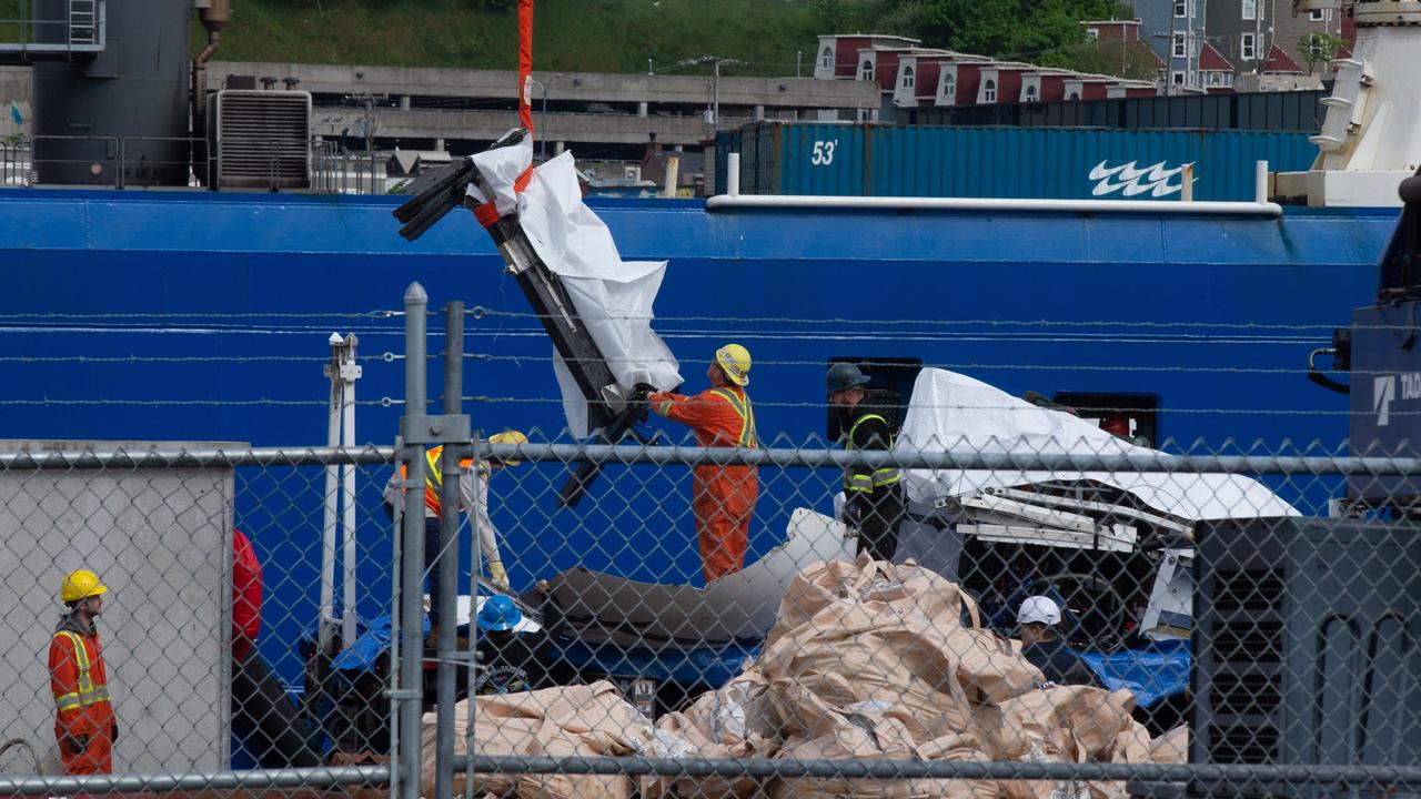 Another large piece of the wreck is unloaded at the dock. Picture: Canadian Press/Shutterstock