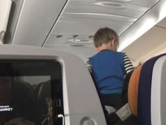 A passenger has filmed a 'demonic' child who screamed during an entire eight-hour flight. Picture: