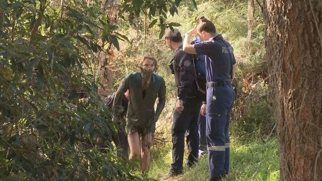 Elle Booth ran into Georges River to try and escape the two dogs. Picture: 9News