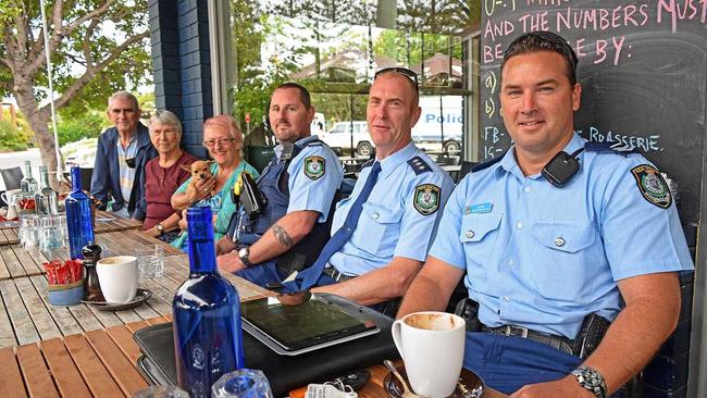 COFFEE WITH A COP: Snr Sgt Michael Jones, Insp Brendan Gorman and Snr Const Daniel Dunn chat to locals in Woolgoolga. Picture: Jasmine Minhas